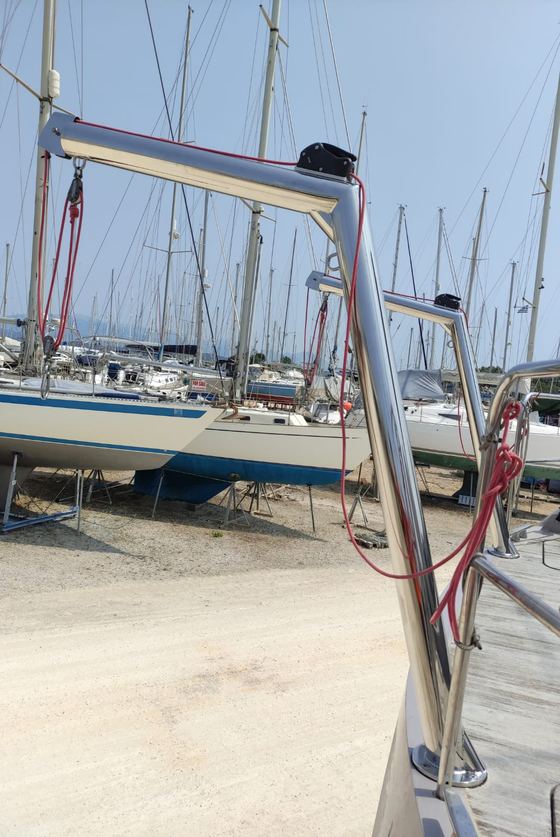 Stainless davit arm on a yacht ashore
